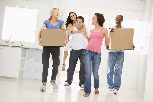Removal company team helping with a house move in New Barnet