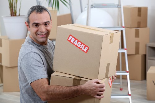 Employee carrying out ethical compliance checks for Man With Van Newbarnet