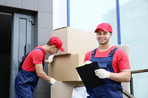 Man and van removals service loading items in New Barnet