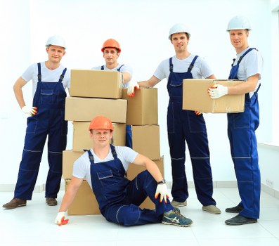 Careful loading of household items during a New Barnet move