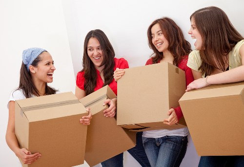Moving team preparing items safely for transport
