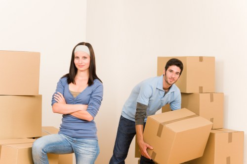 Furniture and boxes being loaded into a moving van