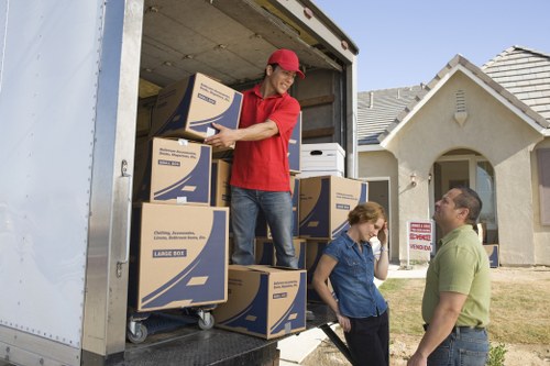 Packed boxes and furniture ready for house removals in New Barnet