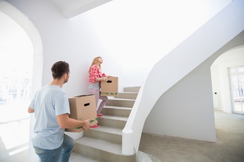Loading furniture into a van for a New Barnet relocation