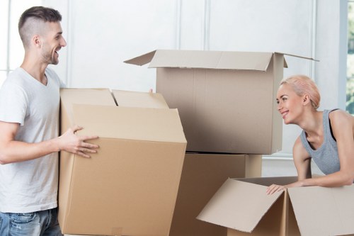 Packers organising boxes and furniture for a New Barnet relocation
